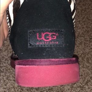 UGG short zebra print boots with pink detailing.